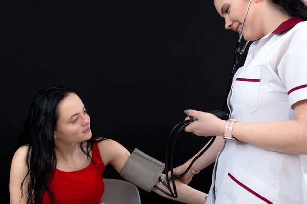 Doctor Checking Blood Pressure Patient Selective Focus Close Isolated Black Royalty Free Stock Images