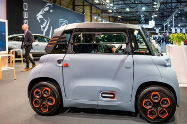 Riga, Latvia, April 29, 2022: Citroen Ami electric small ev car fun cube on wheels premiere at a motor  show, 2022 model