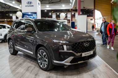Riga, Latvia, April 29, 2022: Hyundai Santa Fe crossover premiere at a motor show, model 2022, front view clipart