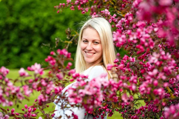 Close Portrait Smiling Blonde Woman Blossoming Garden Spring Selective Focus — Stock Photo, Image