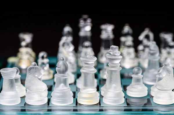 Clear Glass Transparent Chess Pieces Checkerboard Selective Focus Closeup Isolated — Stockfoto