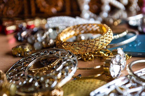 close-up of beautiful costume jewelry, earrings, beads, bracelets and rings