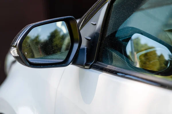 side rear view mirror on a modern car, close-up