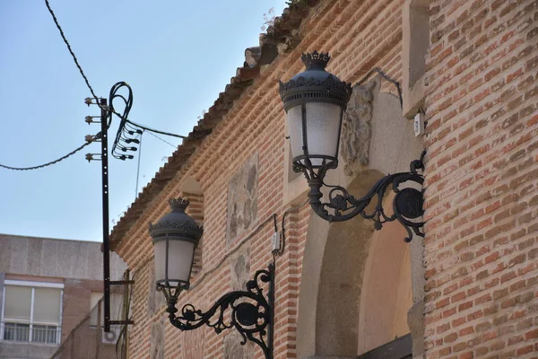Vintage street lamps on house during daytime