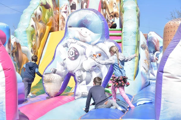 Happy Children Playing Inflatable Castle — Stock Photo, Image