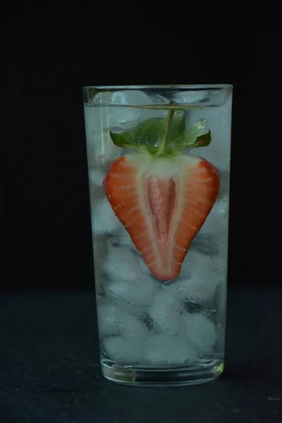 Drink Ice Cut Strawberry Served Glass Dark Background — стоковое фото