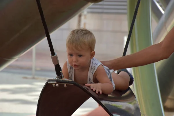 Cute Toddler Boy Swinging Horse Swing Playground — Stockfoto