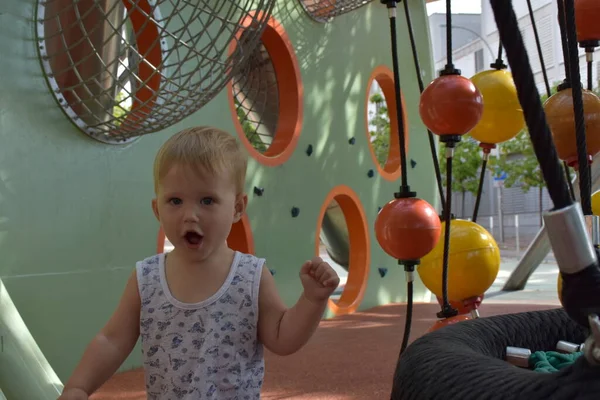 Little Boy Playing Hanging Plastic Balls Playground — Stockfoto