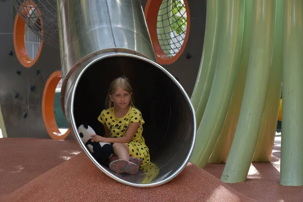Cute Little Girl Playing Modern Playground — Fotografia de Stock