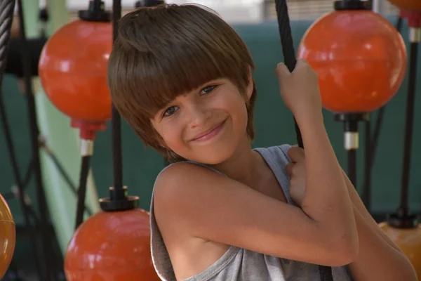 Cute Boy Resting Playground Hanging Plastic Balls — Fotografia de Stock