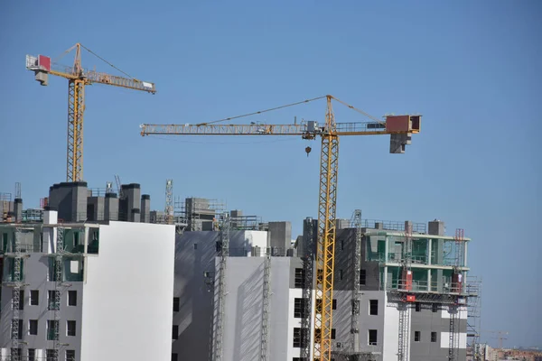 Construction Cranes Buildings Blue Sky — ストック写真
