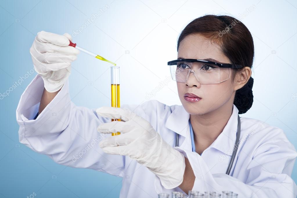 Female researcher working with chemical