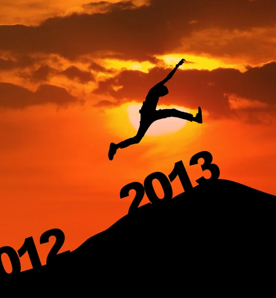 2013 silhoutte hoppa nyår — Stockfoto