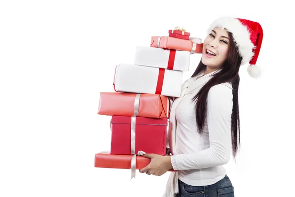 Presentes de Natal de menina com chapéu de Santa — Fotografia de Stock