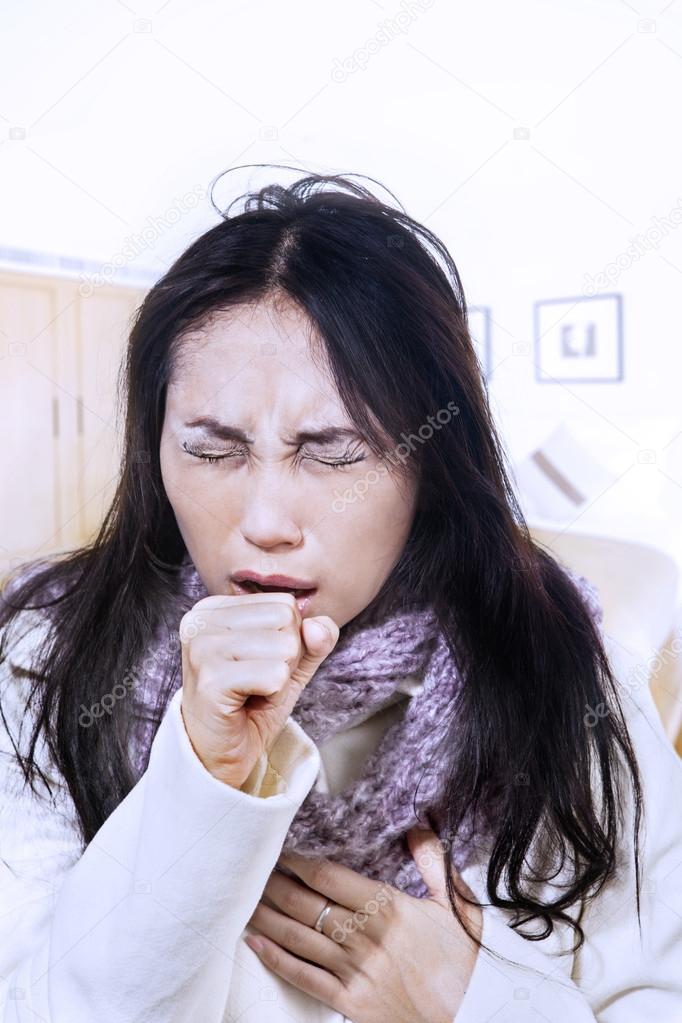 Bad cough by woman in winter