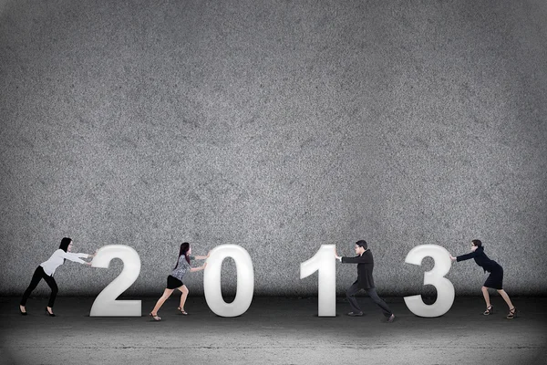 Zakelijke teamwerk in nieuwe jaar 2013 — Stockfoto