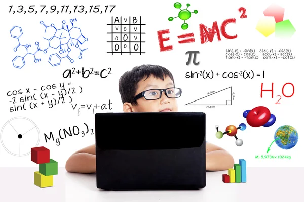 Smart asian boy with laptop — Stock Photo, Image