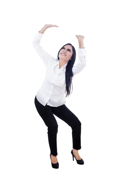 Businesswoman pushing something — Stock Photo, Image