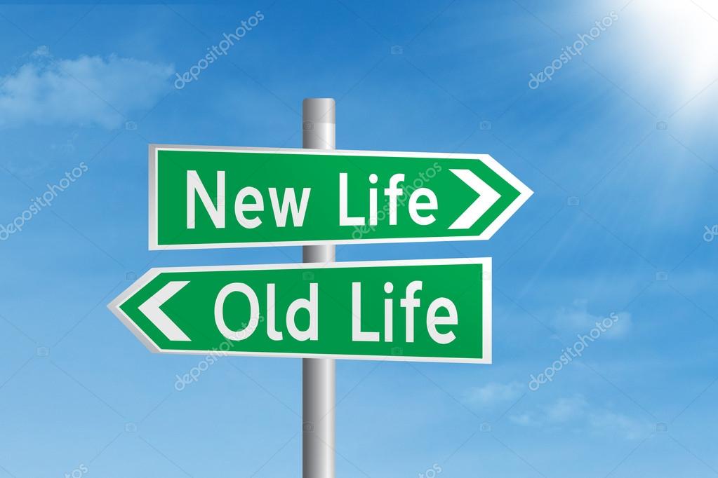 Green road sign of new life and old life under blue sky