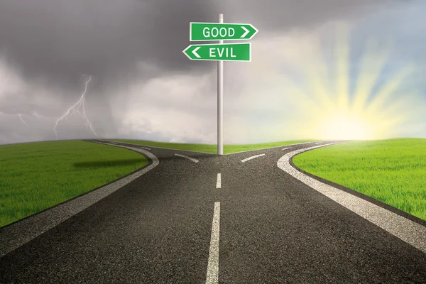 Road sign of good vs evil — Stock Photo, Image