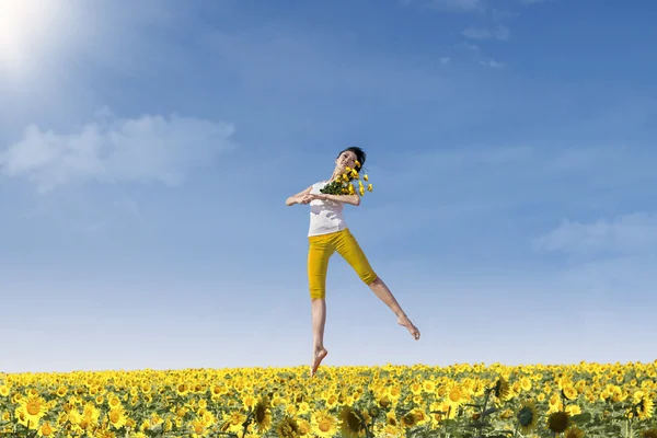 Beautiful dancing with sunflowers — Stock Photo, Image