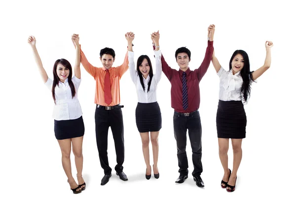 Business team raised hands in victory — Stock Photo, Image