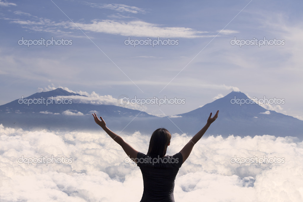 Beautiful mountain landscape with silhouette of woman