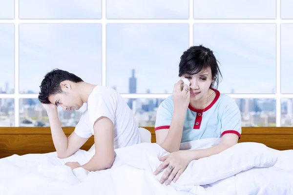 Couple fight on bed in apartment — Stock Photo, Image