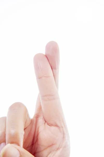 Cross finger gesture on white — Stock Photo, Image