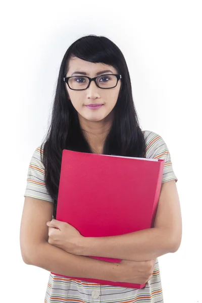 Confident female student with red folder - isolated — Stock Photo, Image