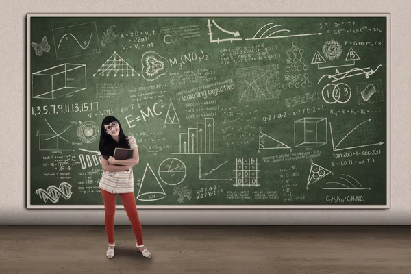 Beautiful female student and hand drawn chalkboard — Stock Photo, Image