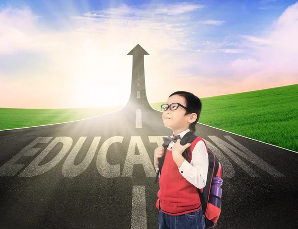 Boy student on education success road — Stock Photo, Image