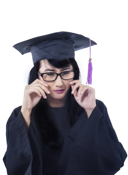 Asian female graduate crying - isolated — Stock Photo, Image
