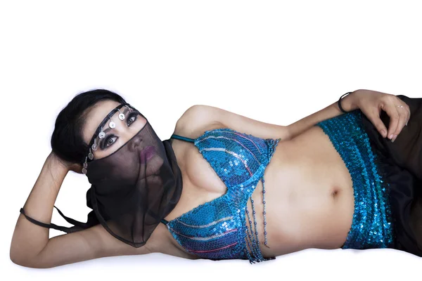 Attractive belly dancer lying - isolated — Stock Photo, Image