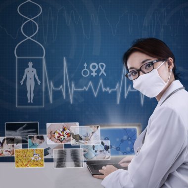 dizüstü bilgisayarda çalışma çekici modern doktor