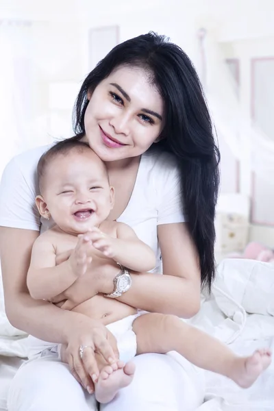 Close-up mother and baby at home — Stok Foto