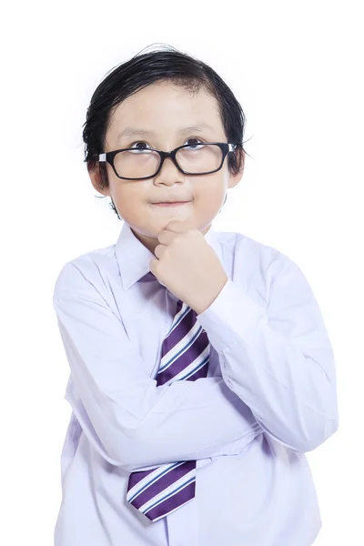 Confident business boy thinking - isolated — Stock Photo, Image