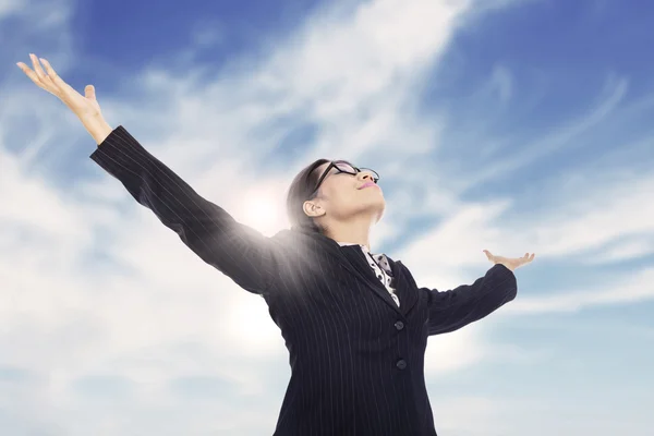 Businesswoman stretch arms — Stock Photo, Image