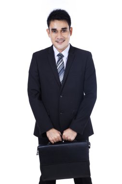 evrak çantası ile Asya iş adamı