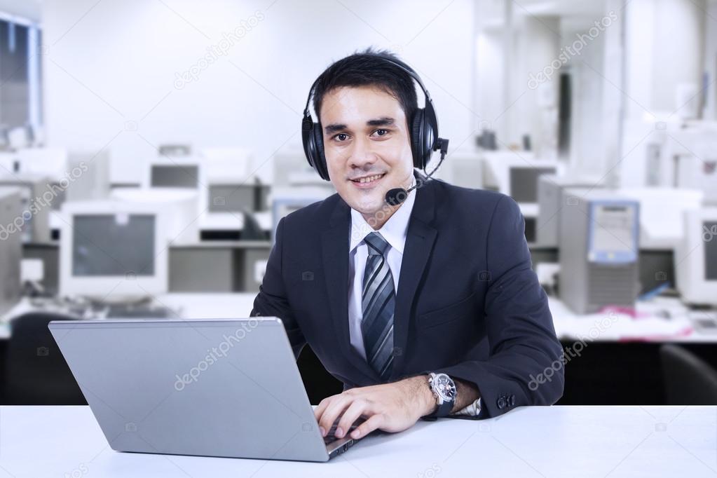 Portrait of friendly customer support