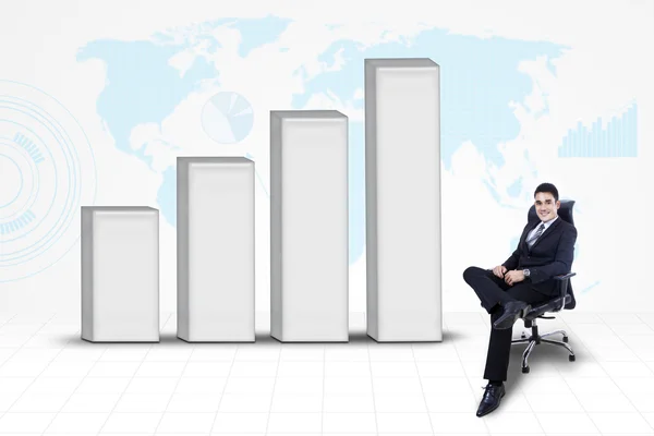 Businessman with bar chart and world map background — Stock Photo, Image