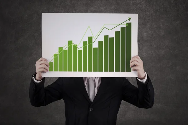 Businessman hiding behind the graph — Stock Photo, Image