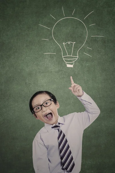 Little businessman and drawn lamp — Stock Photo, Image