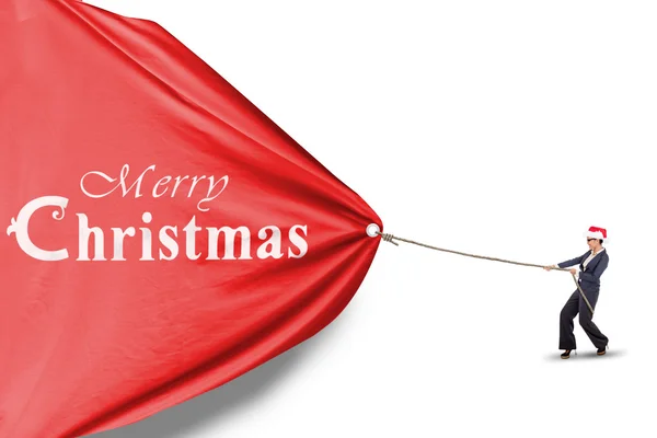 Empresária está puxando banner de Natal — Fotografia de Stock
