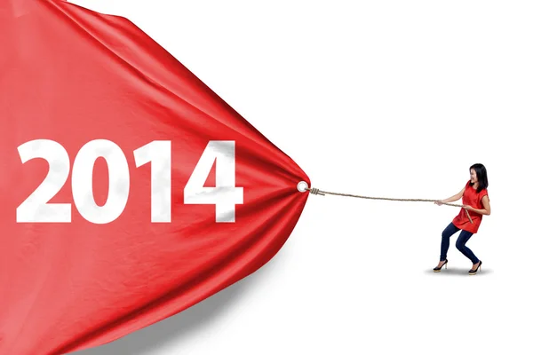 Woman pull new year of 2014 - isolated — Stock Photo, Image