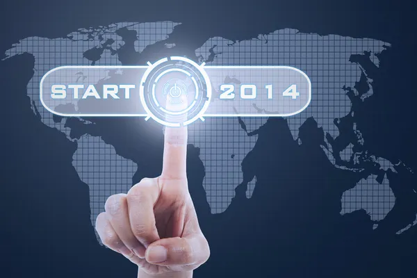 Finger touching button start to 2014 — Stock Photo, Image