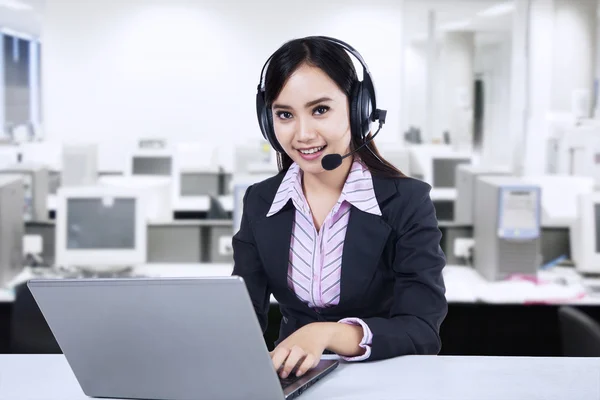 Friendly young woman operator — Stock Photo, Image