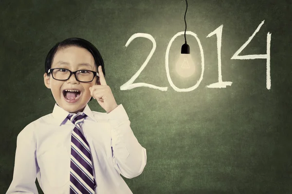 Estudante masculino com número de ano novo 2014 — Fotografia de Stock