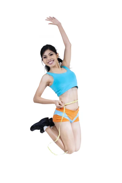 Happy fitness woman jumping — Stock Photo, Image