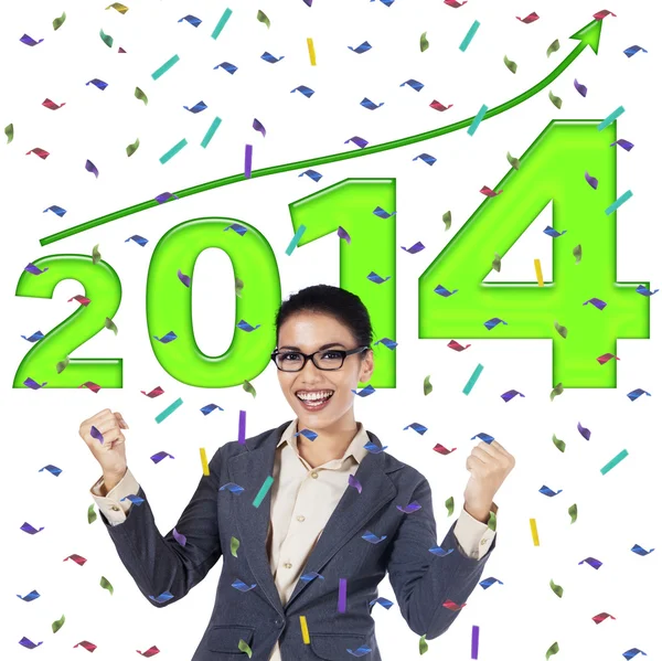 Empresária feliz celebrando um novo ano 2014 — Fotografia de Stock
